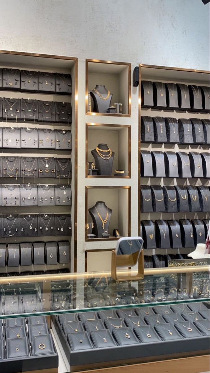 Palm Beach jewelry wall display with necklace cases.
